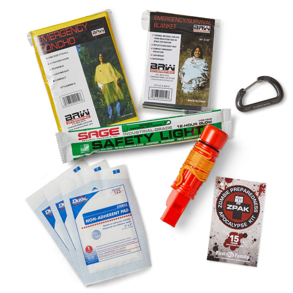 Collection of emergency supplies including a safety light, emergency blanket, and other survival items on a white background.